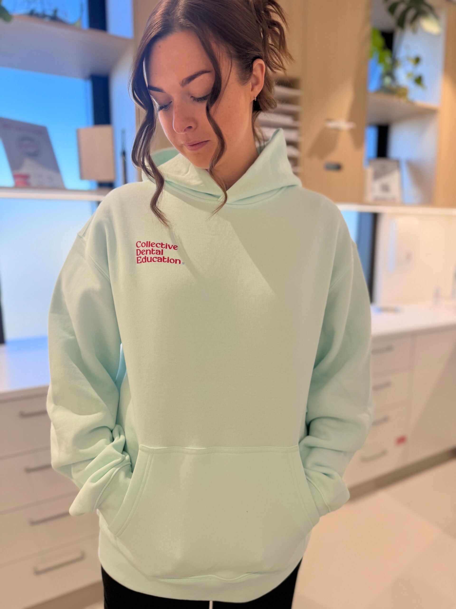 Seafoam dental assistant hoodie, front view