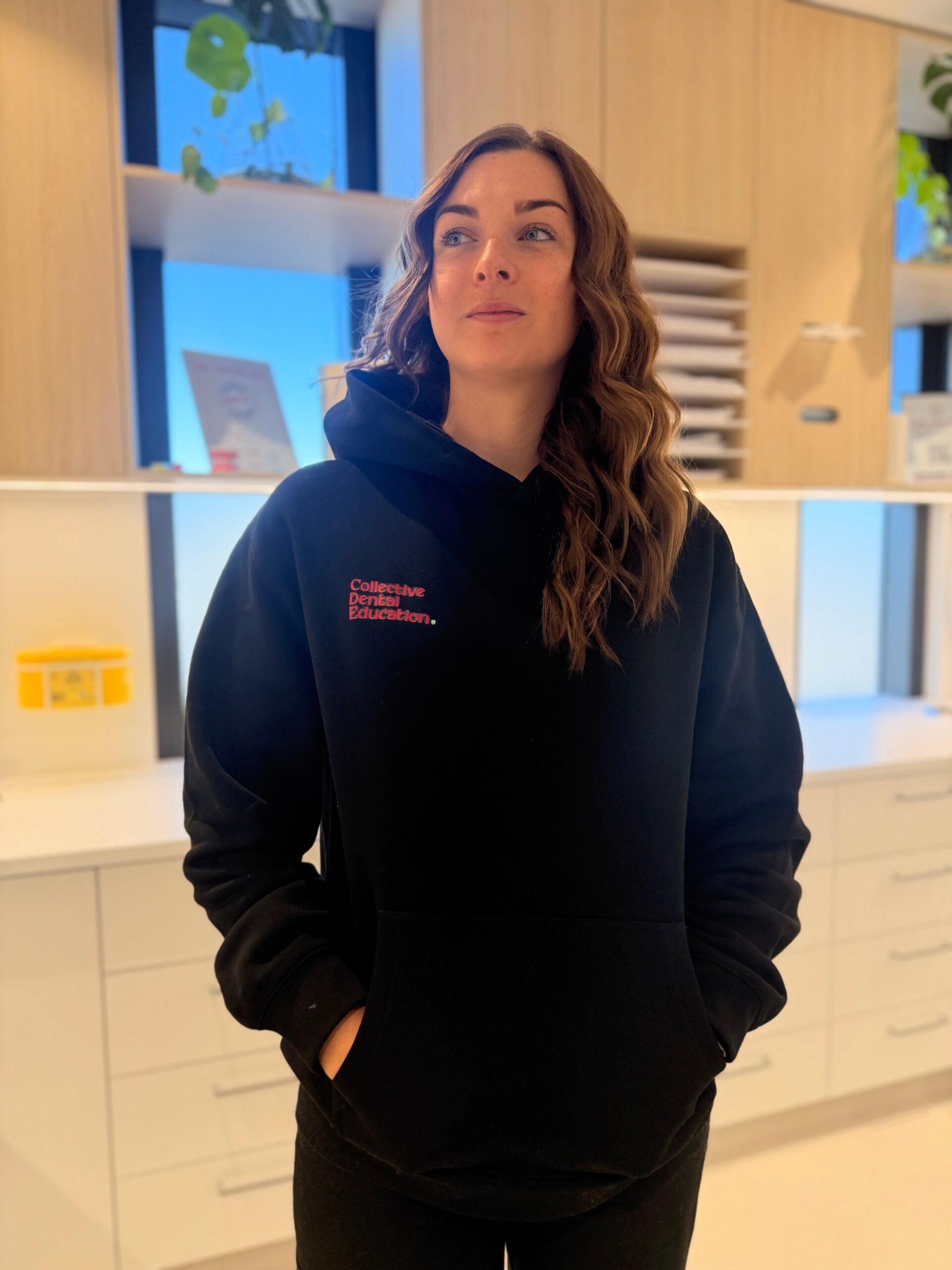 Black hygienist hoodie, front view