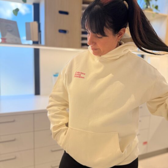 Oral health therapist hoodie in ecru, worn front view