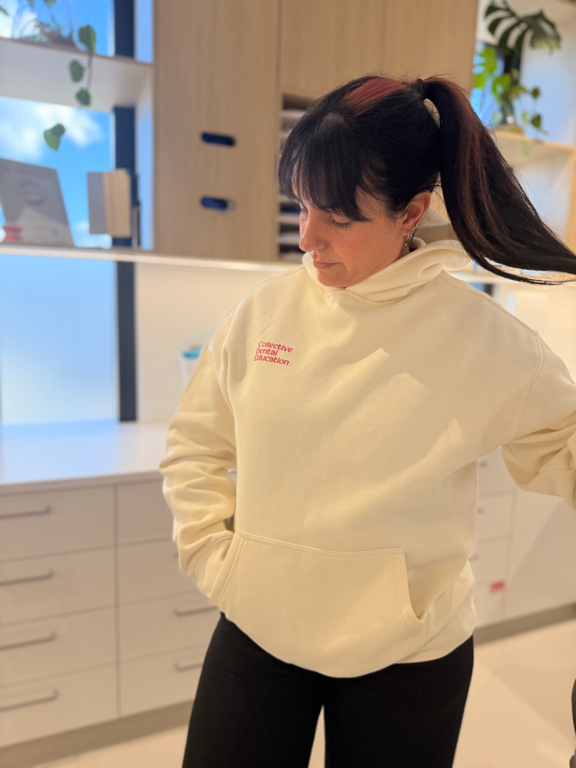 Oral health therapist hoodie in ecru, worn front view